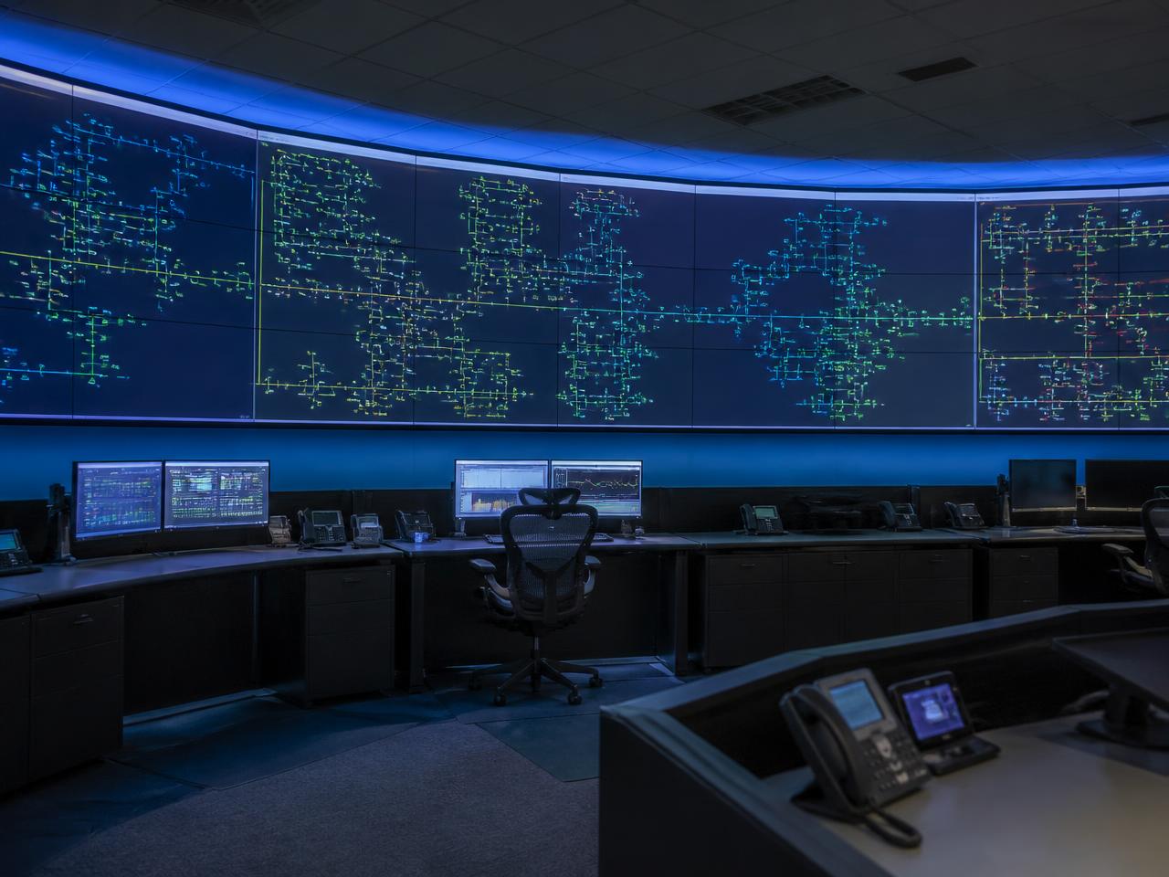 Operations team monitoring utility and infrastructure systems